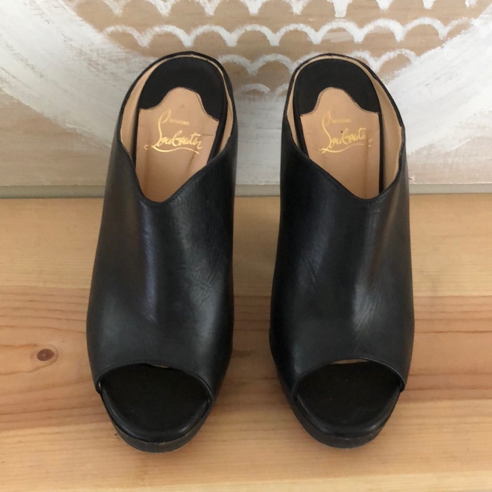 Louboutins black mules